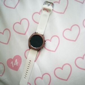 Samsung Smartwatch with White Band and Bronze Bezel